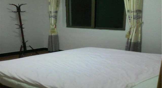 Tengchong Hongxing Hostel, Prenota Ostello Tengchong Yunnan
