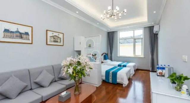Кровать в общем номере Beidaihe Deyuan Hotel