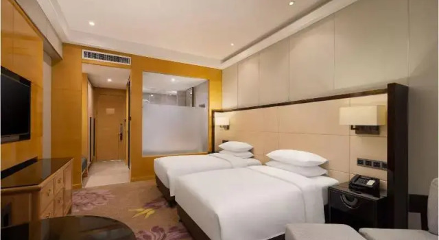 Двухместный номер Deluxe Pullman Qingdao Ziyue