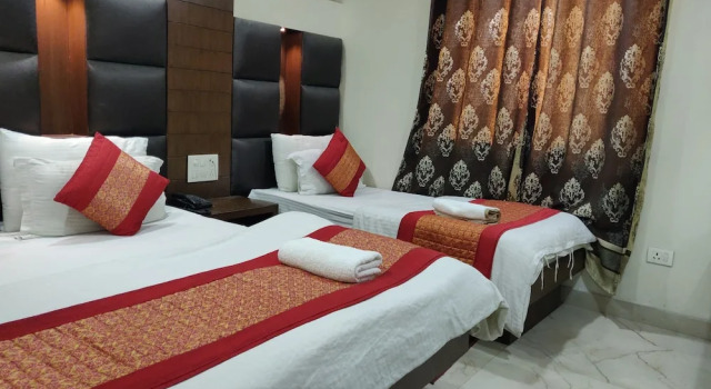 Трёхместный номер Deluxe TG Tashkent Hotel