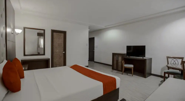 Suite Capital O 740 Bliss Hotel Dau