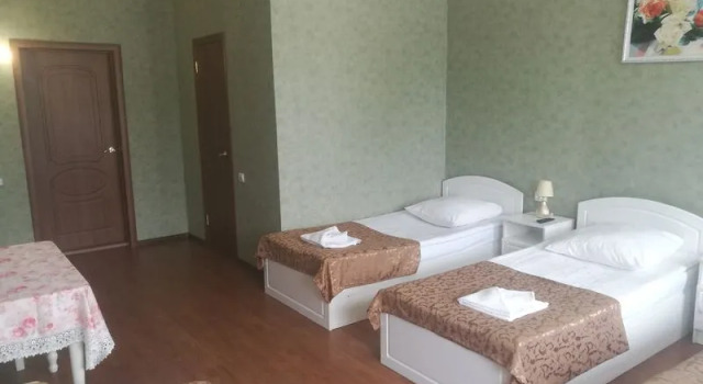 Кровать в общем номере Русь