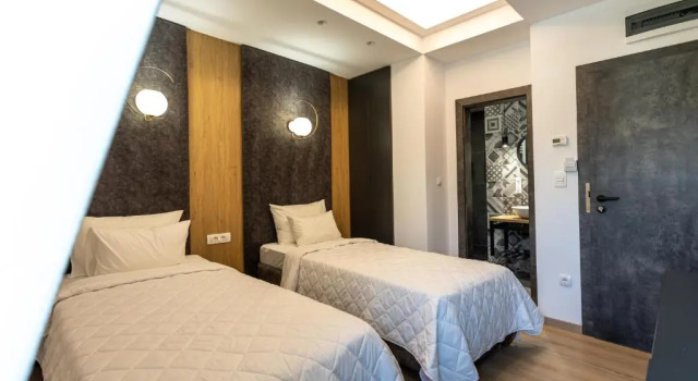 Deluxe Dvoulůžkový s manželskou postelí pokoj a výhledem na město Grand Central Hotel
