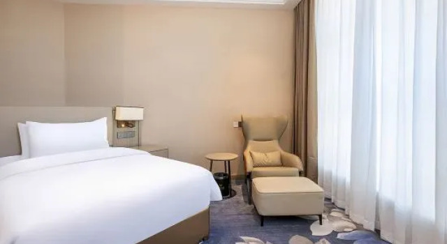 Семейный люкс Executive Vienna International Hotel (Jiuquan Wanda Plaza)