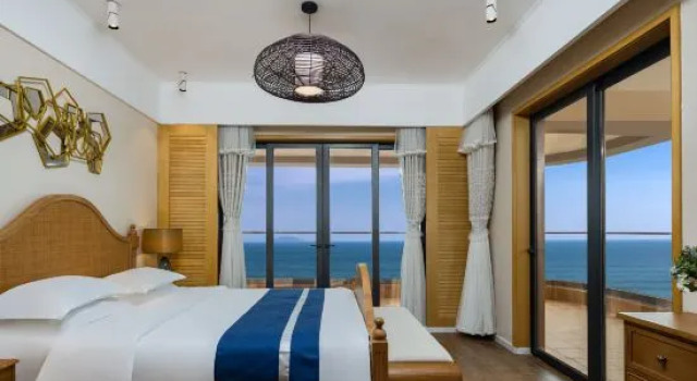 Люкс с 3 комнатами с видом на море Wanning Riyuewan Shangyi Seaview Surf Apartment