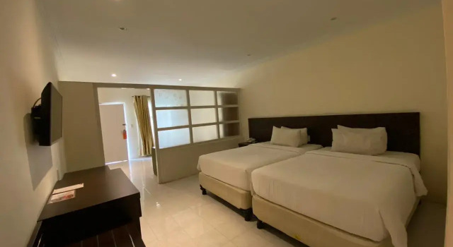 Номер Deluxe Khas Parapat