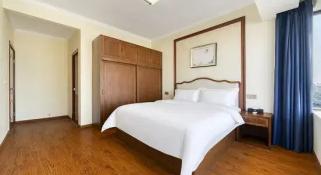Семейный люкс Meishan Huangming Hotel (Sansuxuan Branch)