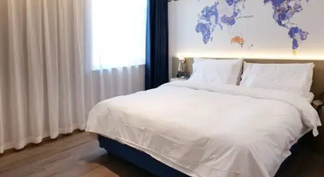 Люкс Premier Kyriad Hotel (Weihai Xingfumen Weigao Square)