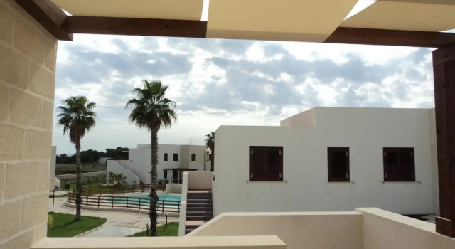 Апартаменты Le Casuzze del Residence Burrone Trilocale