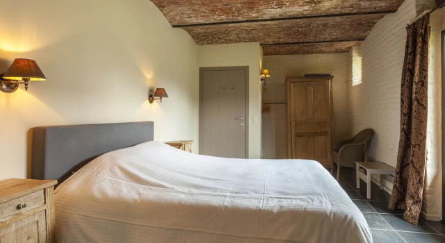 beautifull renovated farmhouse with traditional elements and a big garden