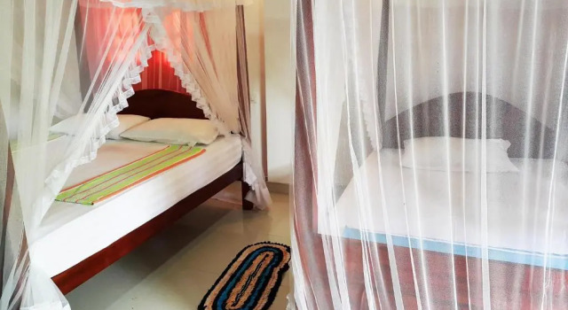 Habitación triple Estándar con balcón y con vista al jardín Splendid Lodge