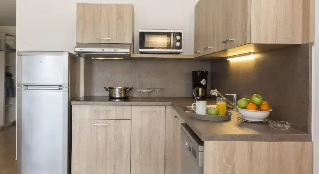 Кровать в общем номере Residence Odalys Stella Di L'aria