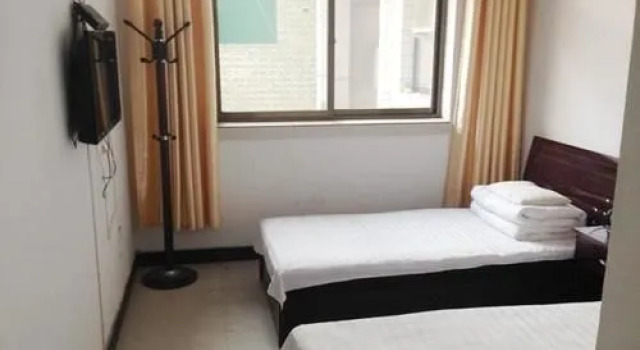 Pingyao Riyueli Hotel, Забронировать Отель Отели Пинъяо с парковкой, рядом с Ji's Old Residence, Парковка