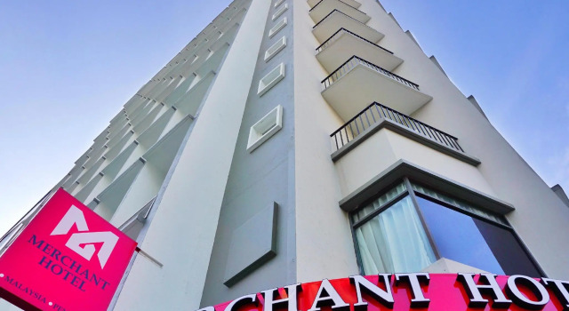 Кровать в общем номере Merchant Hotel