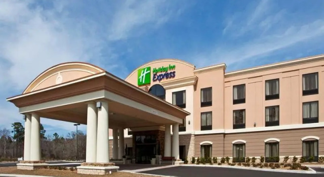 Кровать в общем номере Holiday Inn Express & Suites Perry by IHG