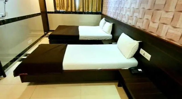 Четырёхместный номер Deluxe с красивым видом из окна Hotel Shambuji