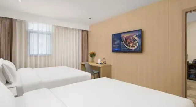 Двухместный люкс Superior 7 Days Premium Hotel (Zhumadian Tianzhong Mountain Avenue)
