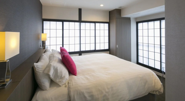 Четырёхместные апартаменты Deluxe с 3 комнатами с балконом The Ridge Nozawa Apartments