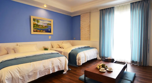 Четырёхместный номер Deluxe с балконом Yunju Hotspring Villa