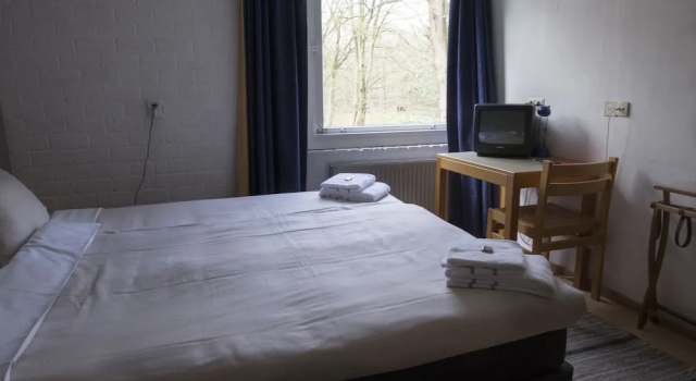 Номер Economy Hotel de Oorsprong