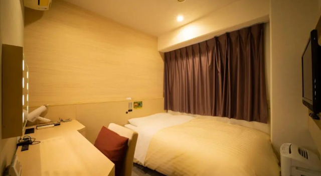 Кровать в общем номере (женский номер) Natural Hot Spring SUPER HOTEL Kumamoto Chamber of Commerce