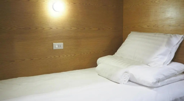 Кровать в общем номере Terminal Hostel