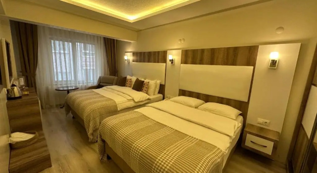 Четырёхместный номер Standard Line Suite Hotel