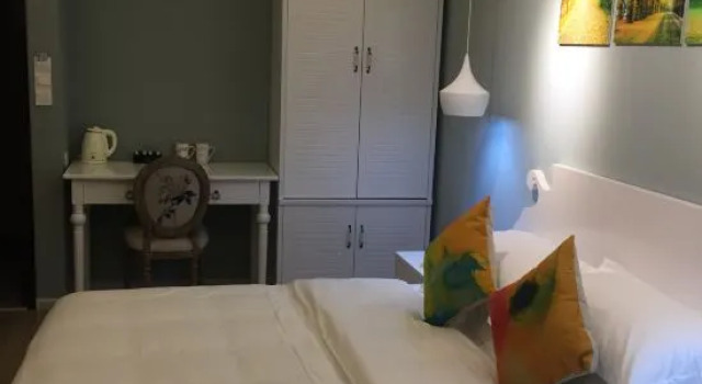 Qing Niao Yi Shu Hotel, Buchen Sie Hotel Chenggong Kunming