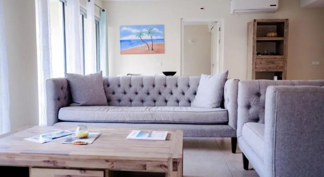 Beautiful Garden View Condo Suite 17, Забронировать Отель Отели в центре Ян-Тил, в центре