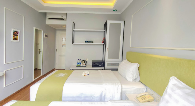 Номер Deluxe Hotel Dafam Enkadeli Thamrin Jakarta