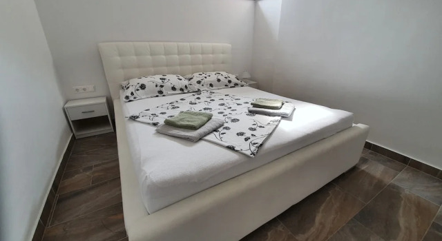 Апартаменты Цокольный этаж с 2 комнатами Apartments Ljubic