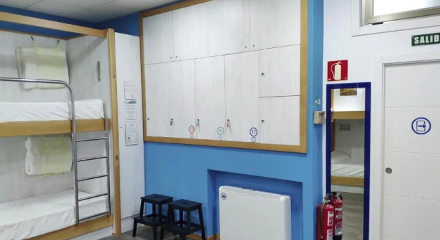 Кровать в общем номере Albergue Corredoiras