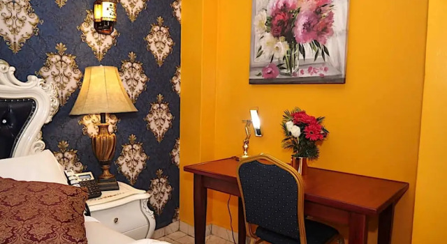 Номер Deluxe Marriot Metropolitan Hotel
