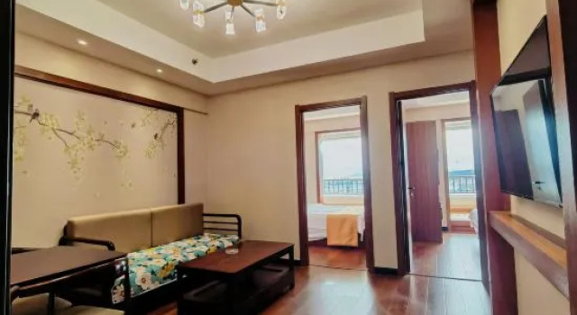 Люкс Muhai Lvsu Seaview Apartment (Development Zone Shibeiwan Water Park Branch)
