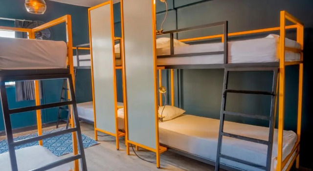 Кровать в общем номере Hotel Virreyes