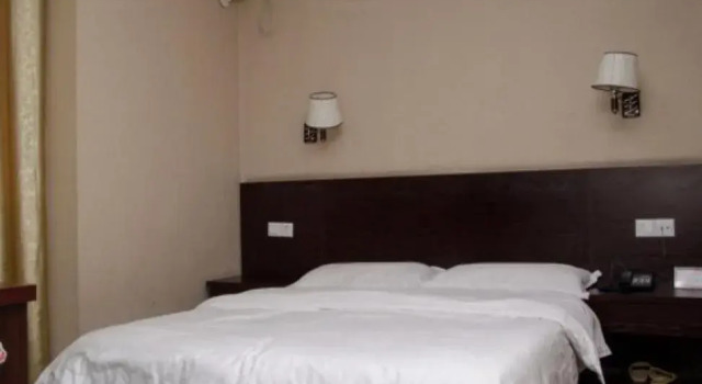 Yichang Jungang Business Hotel, Varaa Hotelli Yichang Hubei