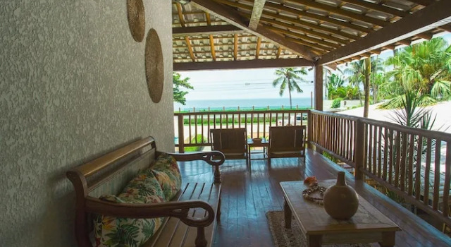 Кровать в общем номере с 6 комнатами с видом на океан Tropical Beach