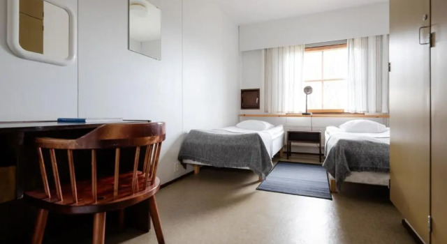 Кровать в общем номере Lapland Hotels Kilpis