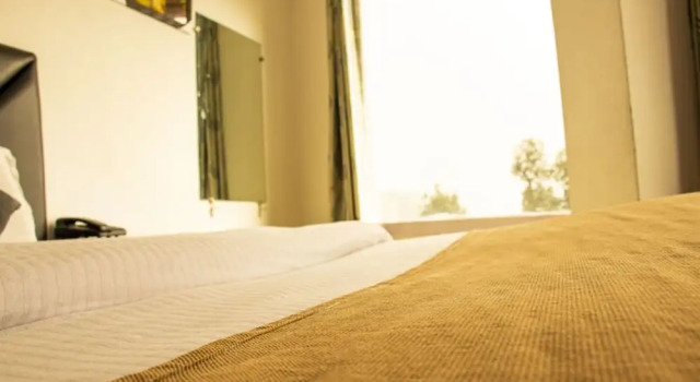 Четырёхместный номер Deluxe Goroomgo Hotel Jasmine Dalhousie