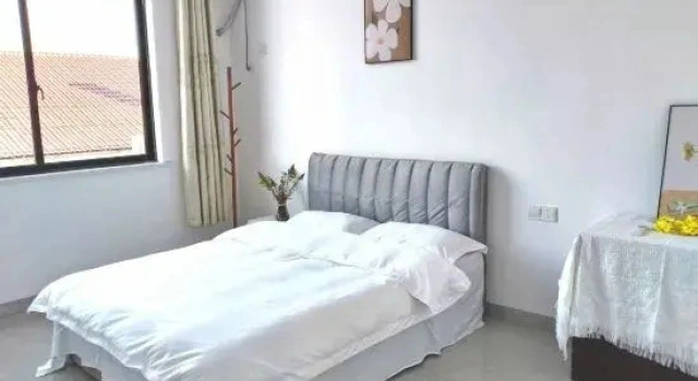 Люкс Fuliang Xinxin Two-Bedroom Homestay