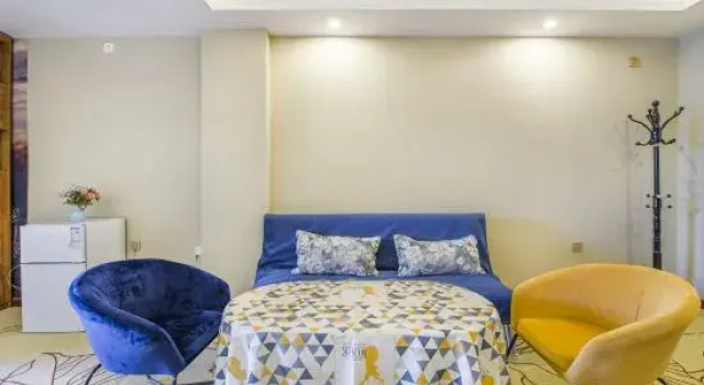 Кровать в общем номере Korla Star Dexiang Hotel