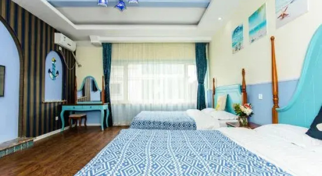 Кровать в общем номере Jinlong Hotel
