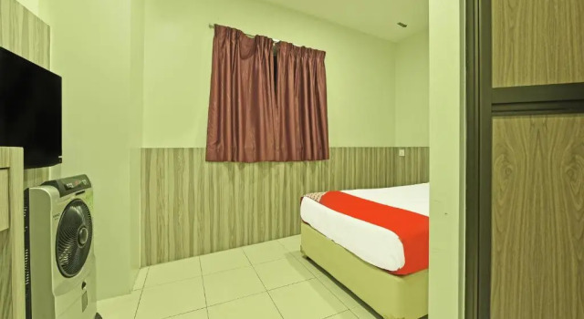 Номер Deluxe Super OYO Capital O 90545 Ho Hotel