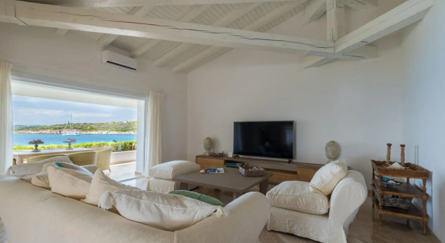 It features a large living area with fully equipped open kitchen and access to the covered terrace d-S'ABBA 1