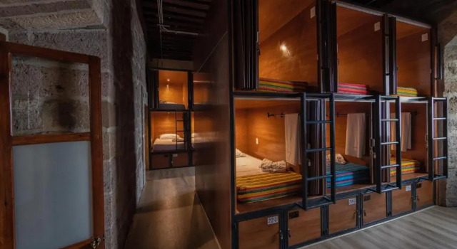 Łóżko w pokoju wieloosobowym OYO Hostal Mich