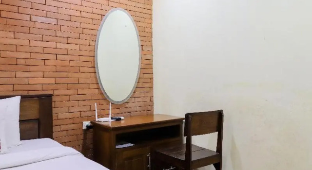 Standard Casal quarto varanda Penginapan Widodo Syariah Borobudur
