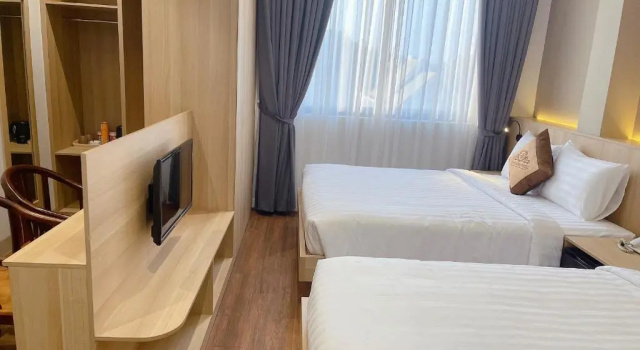 Кровать в общем номере Thanh Bình Hotel - 47 Y Bih - BMT