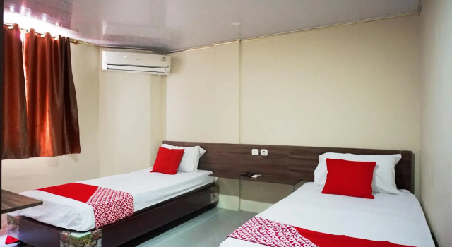 Номер Standard RedDoorz Syariah at D Niel Homestay Mandala Medan