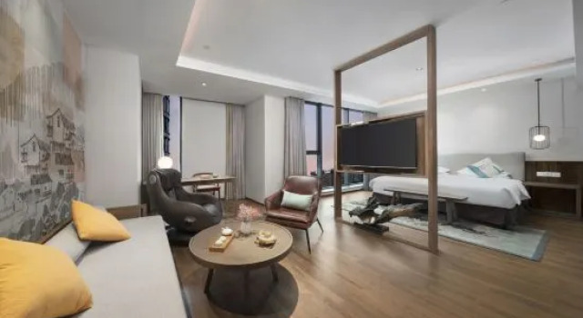 Люкс Manju Hotel (Zhuji Wanfeng Xintiandi Yongli Plaza)