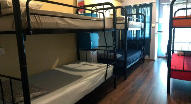 Кровать в общем номере Sandakan Backpackers Hostel